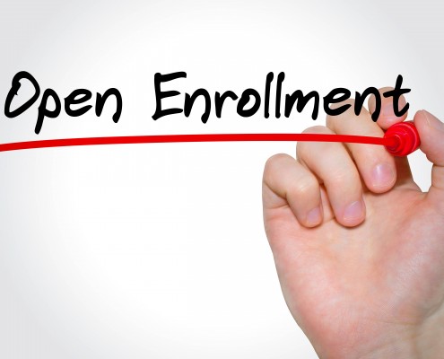 Hand writing inscription Open Enrollment with marker, concept